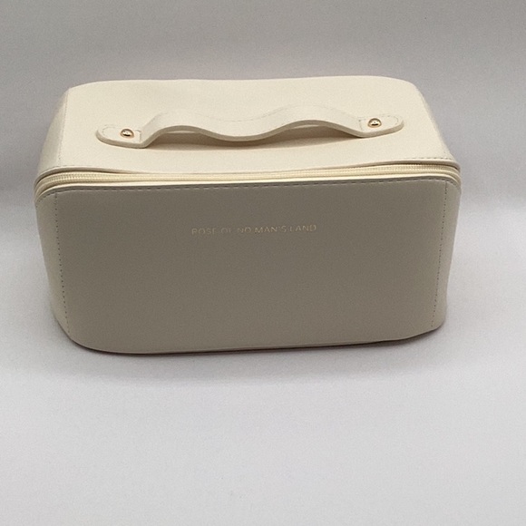 Cream Cosmetic Bag with Smooth Material and Curved Handle - Picture 1 of 10